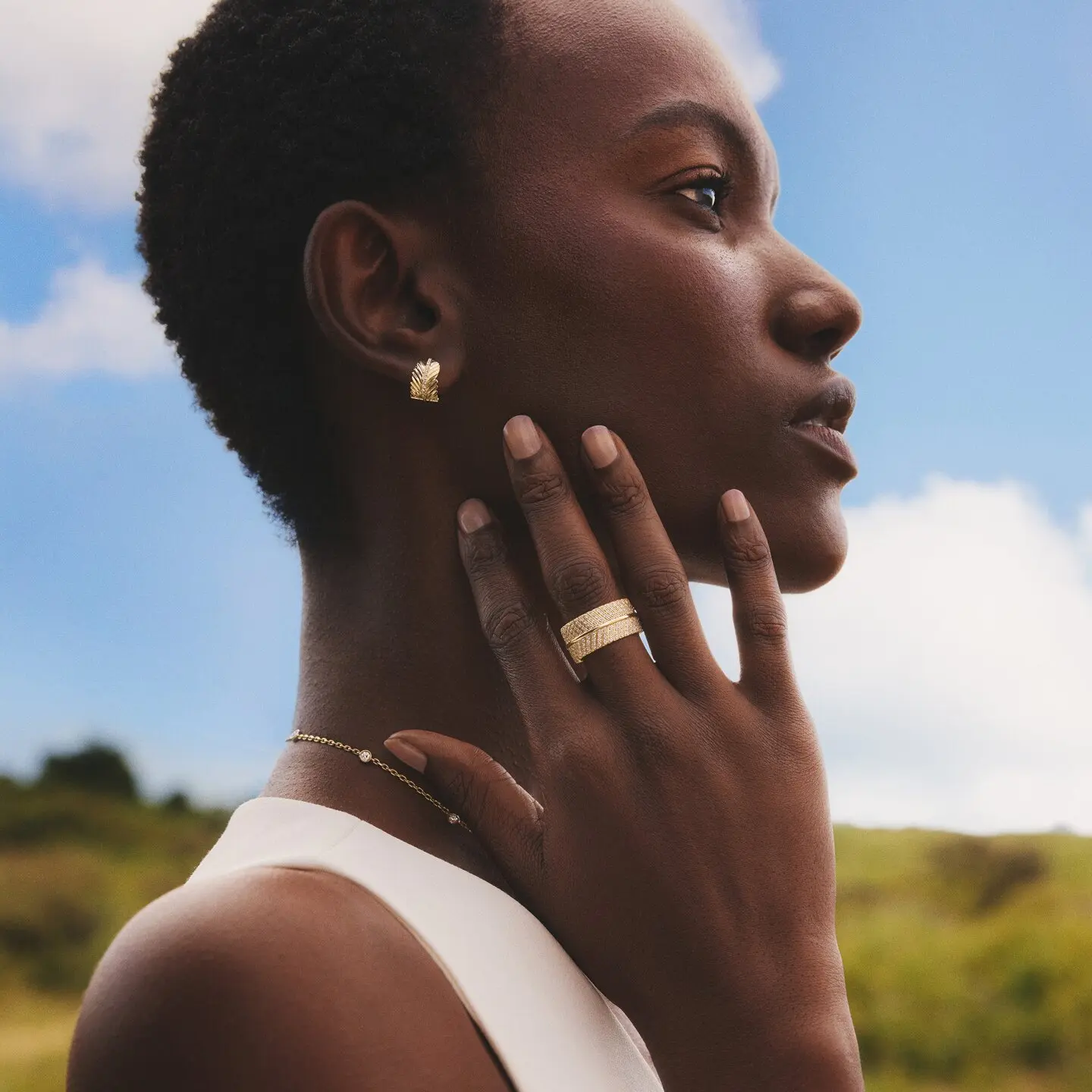 Woman looking away wearing jewelry